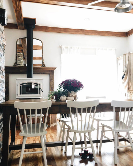 Farmhouse interior featuring white farmhouse stove