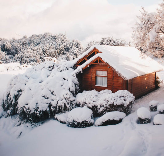 A cabin in winter setting